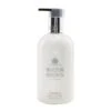 Molton Brown Suede Orris Body Lotion 300ml/10oz 2 Molton Brown Suede Orris Body Lotion 300ml/10oz -Baxt Beauty Shop 26499898121