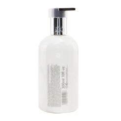 Molton Brown Suede Orris Body Lotion 300ml/10oz 7 Molton Brown Suede Orris Body Lotion 300ml/10oz -Baxt Beauty Shop 26499898121 2